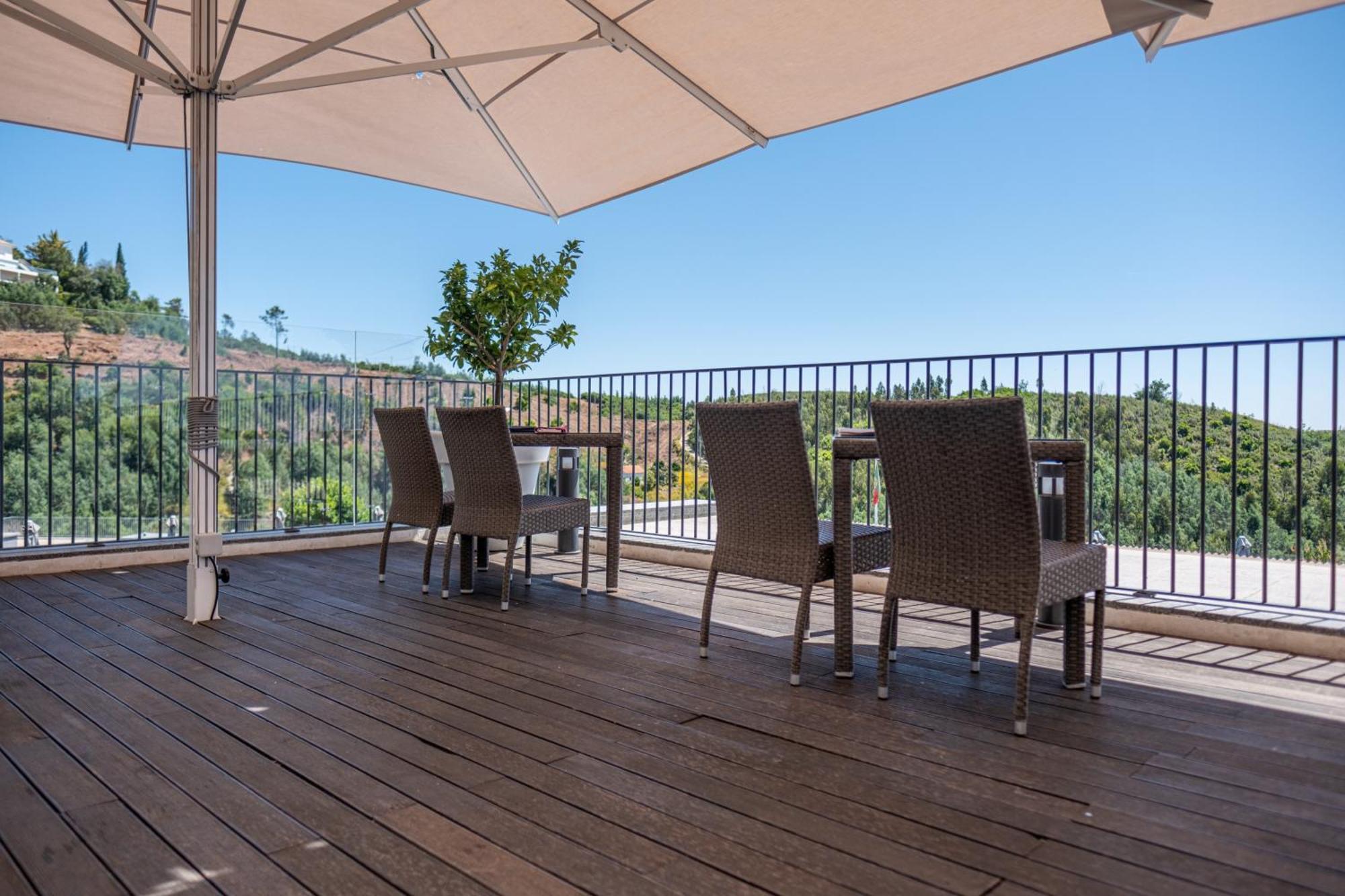 Monchique Resort & Spa Exterior photo Composite wood terrace